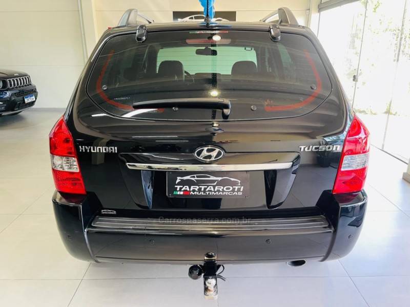 HYUNDAI - TUCSON - 2009/2010 - Preta - R$ 44.990,00