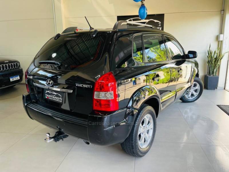 HYUNDAI - TUCSON - 2009/2010 - Preta - R$ 44.990,00